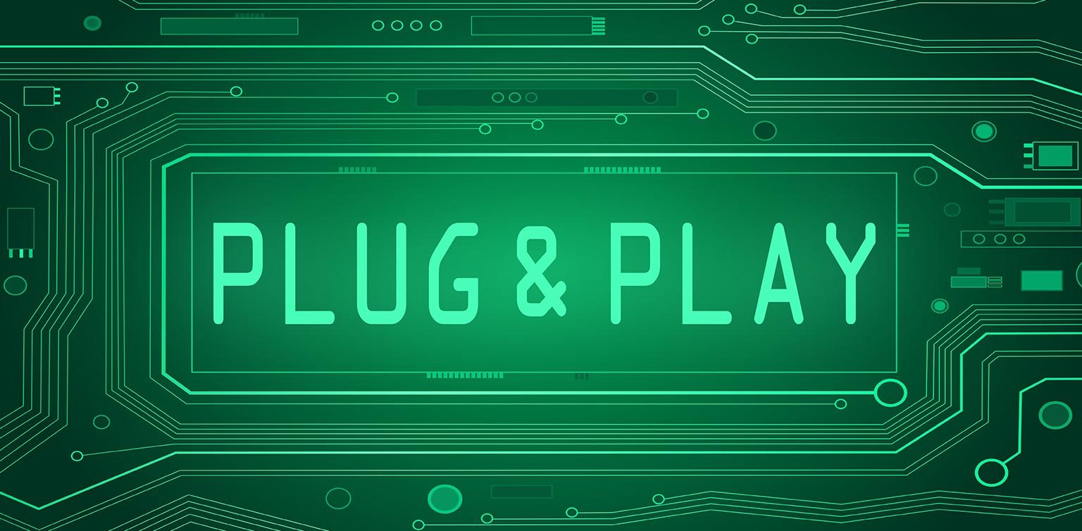 An abstract illustration of a plug and play concept on a green circuit board