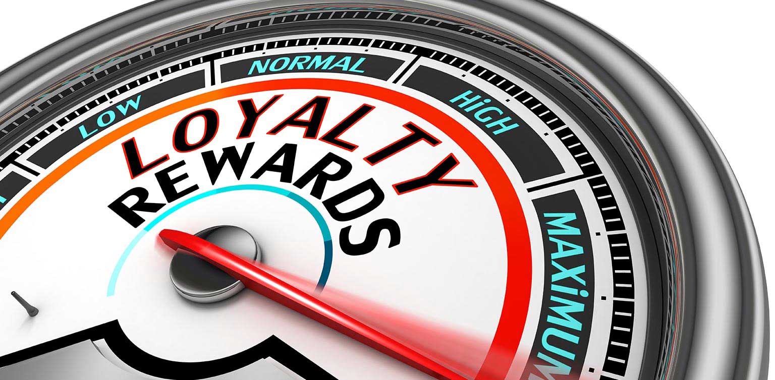 An illustration of a loyalty rewards meter divided into low, medium, high and maximum segments with a red needle on maximum!
