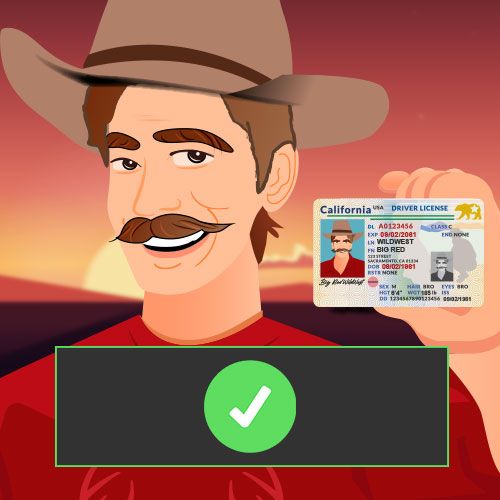 man with hat holding credit card